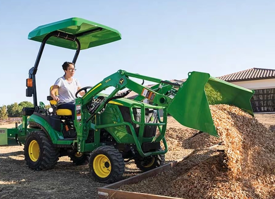 John Deere 1025R Compact Tractor Moving Dirt