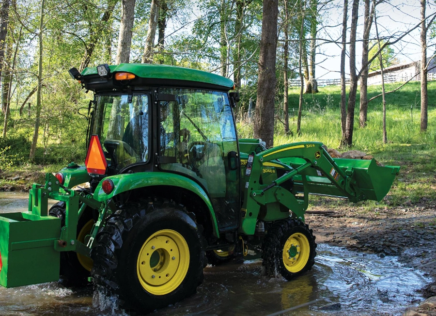 John Deere 3046R Compact Tractor Moving Rocks